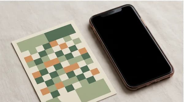 A printed campaign postcard with an illustrative QR-style graphic beside a smartphone.