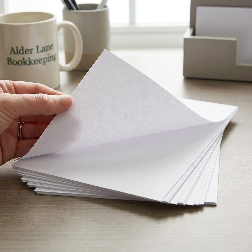 Printed samples showing 70 lb. Opaque Smooth White paper
