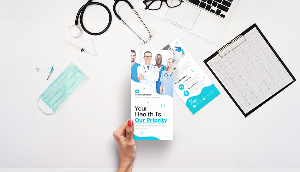 Healthcare brochure and stationery on a desk